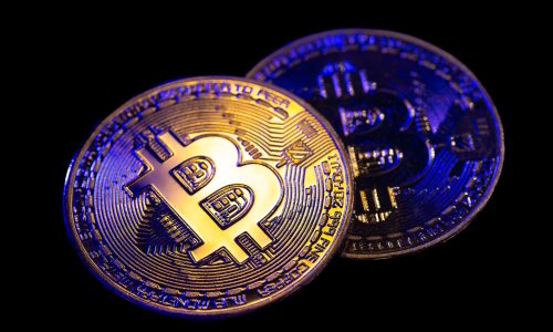Bitcoin coin close-up on a black background. Finance concept. background with cryptocurrency. High quality photo